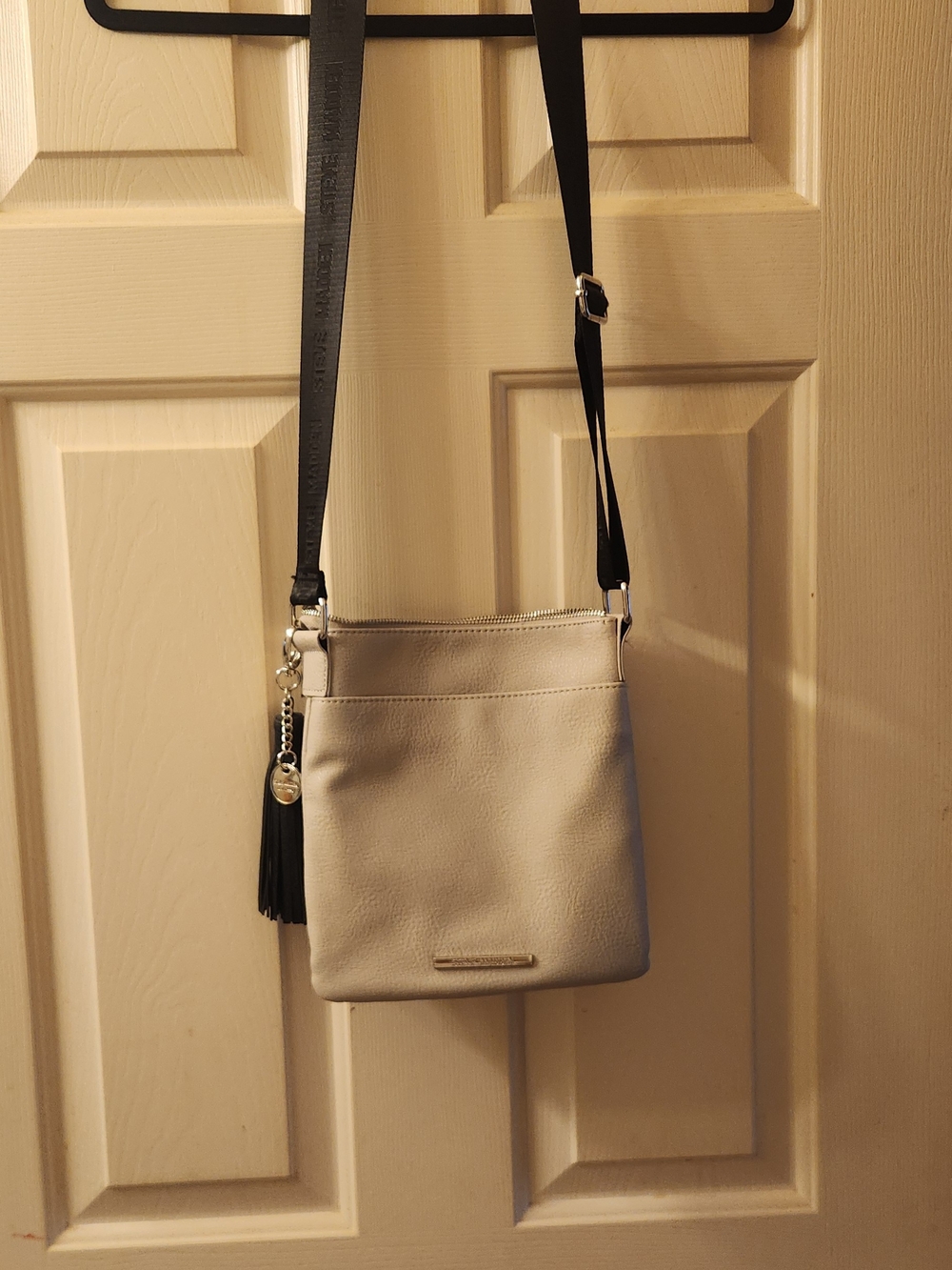 Steve Madden Taupe Crossbody with Black Strap and Tassel Charm